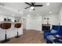 Inviting open floorplan with breakfast bar, fireplace, and comfortable seating at 8701 Huron St # 2-106, Thornton, CO 80260