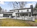 A two-story home with a 3 car garage and a concrete patio at 4362 Peach Ct, Boulder, CO 80301