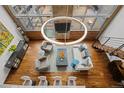Bright living room featuring an overhead view, modern chandelier, and hardwood floors at 1050 Cherokee St # 403, Denver, CO 80204