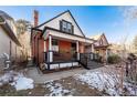 Updated brick home with a welcoming front porch at 1127 Clayton St, Denver, CO 80206