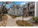 Well-maintained building exterior with neat landscaping and private entrances offers a welcoming curb appeal at 12525 E Tennessee Cir # E, Aurora, CO 80012