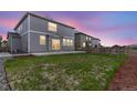 A spacious backyard with a well-maintained lawn and fencing at 2351 Monte Vista St, Fort Lupton, CO 80621
