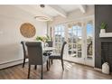 Bright dining room with French doors and modern lighting at 655 N Pearl St # 301, Denver, CO 80203