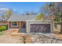 Inviting single-story home with a two-car garage and well-maintained landscaping at 15875 E Custer Dr Dr, Aurora, CO 80017
