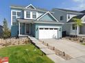Charming two-story home featuring a spacious two-car garage and well-maintained landscaping at 8981 Bellsong Circle Cir, Littleton, CO 80125