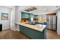 Sleek kitchen with modern appliances, granite countertops, and custom cabinetry at 2322 Arapahoe St, Denver, CO 80205