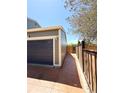 Side view of a two-car garage, showcasing its structure and entrance at 17212 E Oberlin Pl, Aurora, CO 80013