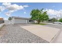 Well-kept home with generous off-street parking and a clean yard at 687 Prairie Ave, Brighton, CO 80603