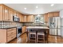 Well-equipped kitchen featuring an island, stainless steel appliances, and stylish cabinetry for a modern feel at 13183 Spica Dr, Lone Tree, CO 80124