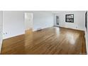Spacious living area showcasing beautiful hardwood flooring at 2900 S Downing St, Englewood, CO 80113
