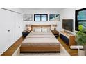 Cozy bedroom with a comfortable bed, soft lighting, and modern decor at 2900 S Downing St, Englewood, CO 80113