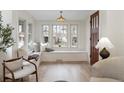 Cozy sitting area with built-in bench seating and an abundance of natural light at 764 S Corona St, Denver, CO 80209