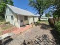Charming single-story home with a cozy front porch and a well-maintained exterior at 444 S Jersey St, Denver, CO 80224