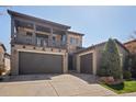 Beautiful home with a two-car garage, one-car garage, balcony and well-manicured lawn, perfect for families at 2236 S Isabell Ct, Lakewood, CO 80228