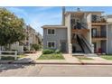 A charming, two-story multi-Gathering home featuring a private deck and convenient front access via outdoor stairs at 6011 Yarrow St # I, Arvada, CO 80004