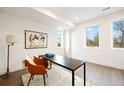 Bright office space with natural light, desk, chair, and decor, creating a comfortable work environment at 8400 W 52Nd Ave, Arvada, CO 80002
