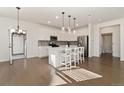 Well-lit kitchen area with an island, stainless steel appliances, and an open layout at 4578 Copeland Cir # 203, Highlands Ranch, CO 80126