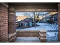 View of the backyard and neighboring townhouses from the patio at 6436 Silver Mesa Dr # E, Highlands Ranch, CO 80130