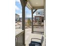 Inviting porch with mountain views and chair seating at 8503 Estes Park Ave, Littleton, CO 80125