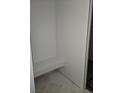Walk-in closet with built-in bench, providing ample storage and organization at 6034 Keyser Pl, Brighton, CO 80601