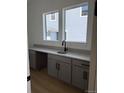 Bright workspace with dual windows and storage cabinets at 898 Coal Bank Trl, Castle Rock, CO 80104