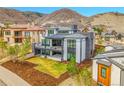 Modern home with large balcony and stunning mountain views, perfect for outdoor living at 8132 Galileo Way, Littleton, CO 80125