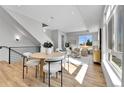 Sun-filled living room featuring hardwood floors and contemporary decor with ample natural light at 5920 W 91St Ave, Westminster, CO 80031