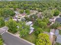 Aerial view of a neighborhood with mature trees and well-maintained homes at 3218 S Lafayette St, Englewood, CO 80113