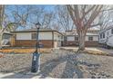 Beautiful ranch home with mature trees, rock landscaping and RV parking at 1740 Shavano St, Longmont, CO 80504