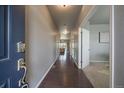 Spacious entryway featuring hardwood floors and neutral paint, creating a warm and inviting atmosphere at 1181 W 170Th Ave, Broomfield, CO 80023