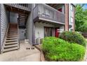 Exterior view of the unit entrance and storage room. Unit 104 has convenient access with its own private stairway at 6388 Oak Ct # 104, Arvada, CO 80004