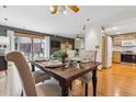 Dining area featuring a dark accent wall and a slider leading to the exterior at 138 S Holman Way, Golden, CO 80401