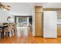 Open kitchen featuring wood cabinets and stainless appliances at 138 S Holman Way, Golden, CO 80401