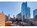 Stunning city view showcasing a modern skyline with blue glass office towers at 1551 Larimer St # 1106, Denver, CO 80202