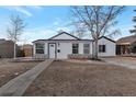 Charming craftsman home with a well-maintained front yard at 1131 S Raleigh St, Denver, CO 80219