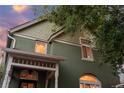 Unique, charming exterior with scalloped siding and a well-maintained facade at 616 W 1St Ave, Denver, CO 80223