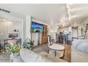 Spacious living room with modern furniture and city views at 550 E 12Th Ave # 509, Denver, CO 80203
