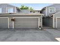 Exterior view of the property showing a well-maintained garage and curb appeal at 2826 S Lansing Way, Aurora, CO 80014