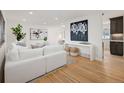 Bright and airy living room with hardwood floors and stylish decor at 5460 E Bails Dr, Denver, CO 80222