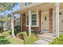 Inviting brick front porch with house number and a cozy, covered entrance at 18171 E Arizona Ave # B, Aurora, CO 80017