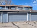 Attached garages offer convenience and ample parking space in this well-kept townhome community at 155 Paris Cir, Aurora, CO 80011