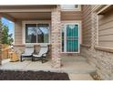 Inviting front porch featuring comfortable seating perfect for relaxing outdoors at 2805 Masters Ln, Castle Rock, CO 80104