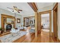 Cozy living room with hardwood floors, fireplace, and wood trim at 3779 Quitman St, Denver, CO 80212