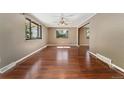 Spacious living room featuring hardwood floors and plenty of natural light at 12408 E Ohio Ave, Aurora, CO 80012