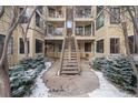 Exterior view of condo building with stairs at 4862 E Kentucky Ave # D, Denver, CO 80246