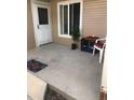 Welcoming front porch with a white door and space for seating at 8112 Gray Ct # 394, Arvada, CO 80003