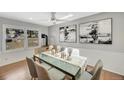 Dining room with modern decor, a wood-burning stove, and natural light at 258 Post Boy Rd, Boulder, CO 80302