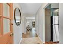 Inviting entryway with hardwood floors and access to the main living areas at 258 Post Boy Rd, Boulder, CO 80302