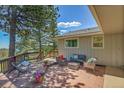 Spacious outdoor patio with comfortable seating area and peaceful surroundings at 258 Post Boy Rd, Boulder, CO 80302