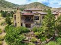 Luxury home nestled in the mountains with a large balcony at 8002 Galileo Way, Littleton, CO 80125